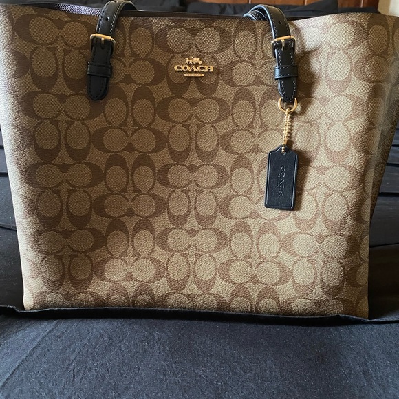 Coach Handbags - Coach Tan/Brown Signature Canvas Tote with Black Trim